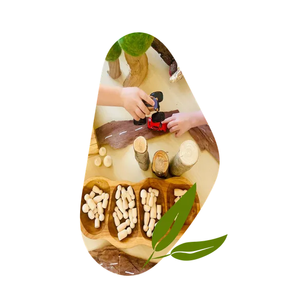 Child exploring natural materials